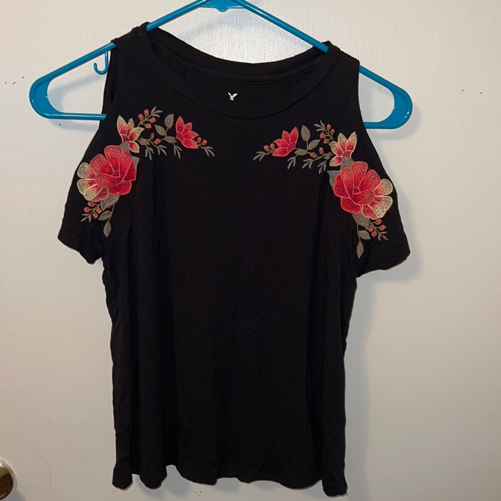 Black off the shoulder top with floral detailing